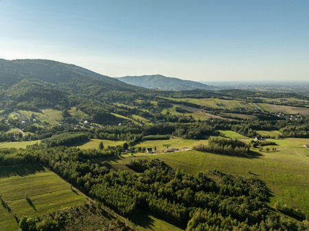 Little Beskids mountain range.Aerial drone view of Rzyki Village in Beskid Maly Poland.Beskid Maly aerial panorama of potrojna hill and czarny gron.Czarny gron in Rzyki, Andrychow, Poland.の写真素材