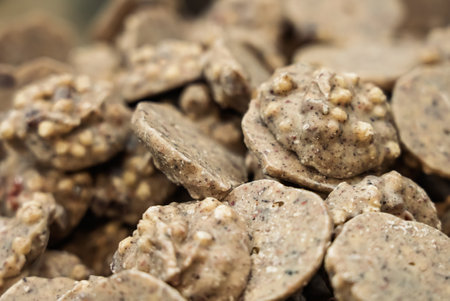 Chocolate cookies in icing. Chocolate sweets. Close-up shots of chocolate cookiesの写真素材
