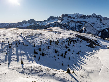 Sella Ronda group. Italian Dolomites drone aerial view in winter snow ski sunny days. Aerial...