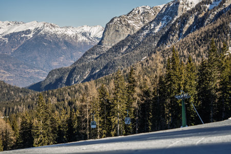 View of sunny winter in dolomites, alps. Italy, Madonna di Campiglio village and a ski resort in Italy. Madonna di Campiglio resort in Val Rendena dolomites trentino Italy. Dolomites in winter.の写真素材