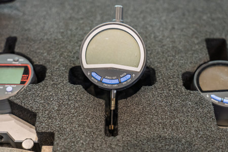 High precision measurement tools in a mechanics plant, caliper, micrometer. The measuring tool for quality assurance of details in mechanical engineering and cnc machines.の写真素材