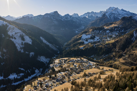 Panoramic view of the Civetta Dolomites mountains in winter, Italy. Aerial drone view of mountains...