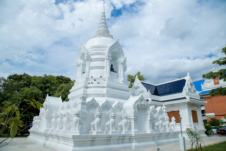 Pagoda Buddhism in temple traditional style by red, orange and green color  of tile on top roof and Thai architecture with sky backgroundの写真素材