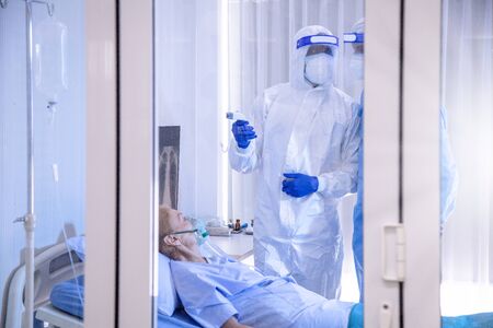 Old Female patients despaired in hospital beds After being infected with coronavirus - covid19. The...