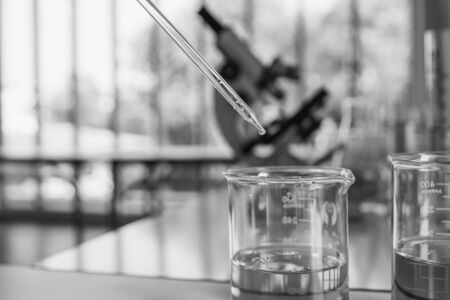 laboratory area for Scientists trying to find vaccine covid19 to defeat the coronavirus. Many scient equipment such as tube and microscope in lab for research.の写真素材
