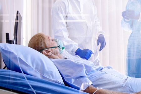 The medical team beat the coronavirus. The patient raised a hand showing goodness along with the...