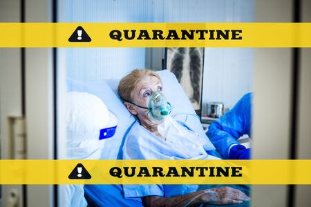 Old woman patient is in state quarantine from coronavirus covid19 outbreak and stay in the quarantine room.の写真素材