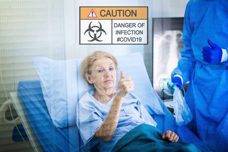 Infected patient on take care of Doctor and nurse with x-ray Lung in quarantine lying on bed in...