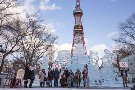 Sapporo, Japan - February 2018 - Sapporo TV tower, famous landmark for visitors around the world, stands tall against blue sky on a cold winter day of November 2018 during Snow Festival in Sapporoのeditorial素材