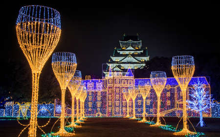 Osaka Castle night illumination, Osaka, Japan - November 2017 : Osaka Castle decorated in reminiscent of Japan during the end of Edo period to Meiji Restoration in Western-inspired installations.のeditorial素材