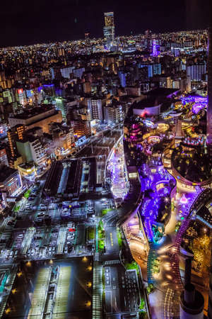 Namba parks, Osaka, Japan. City skyline overlooking Namba District with winter night illumination show around osaka cityのeditorial素材