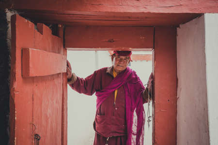 Leh Ladakh , India - April 2019 : Old Tibetan monk in Area of Hemis temple monastery. The Big and Large temple in Leh Ladakh , India from center of temple.のeditorial素材