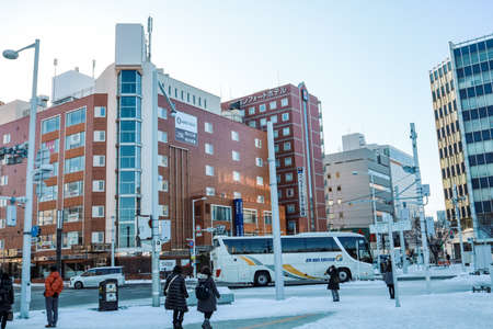 Hakodate, Hokkaido, JAPAN - December 2019: View of modern architect from in front of Hakodate JR Train Station during Winter with snow on ground. One of Hakodate landmark in Hokkaido.のeditorial素材