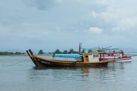 Laem Son National Park, Ranong, Thailand - November 2021 : Pier in National park with local fishing boats in Kapur District from aerial view by drone.のeditorial素材