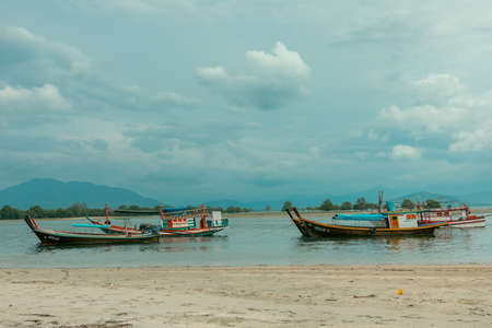 Laem Son National Park, Ranong, Thailand - November 2021 : Pier in National park with local fishing boats in Kapur District from aerial view by drone.のeditorial素材