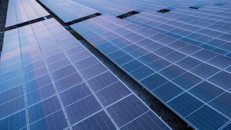 Top view of solar panels (solar cell) in solar farm and sun lighting reflect with copy space....