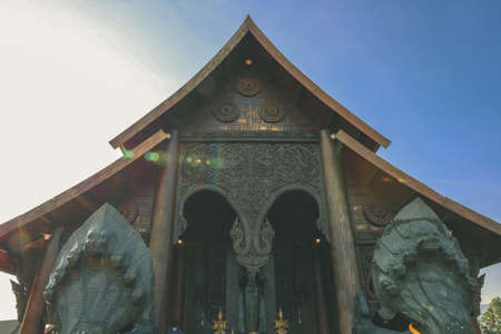 Loei, Thailand 12,2021 Wat Somdet Phu Ruea Ming Mueang (Temple) The temple is built with fine wood timber. The church is made of teak and locate on mountain and one of top viewpoint at Phu ruea.のeditorial素材