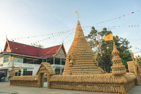 Lom Sak, Phetchabun - December 2021 : Wat Khosa Thachang during sunset. The Pagoda make from rice paddy and interior by fammer which will be built at the end of every yearのeditorial素材