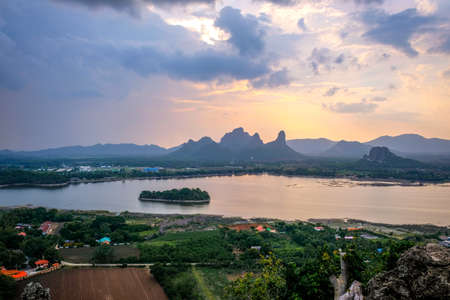 Phu Sub Lek is hidden gem of Lopburi, Thailand to see view of Khao Jeen Lae with unseen sunset sky over the water from lake.の写真素材