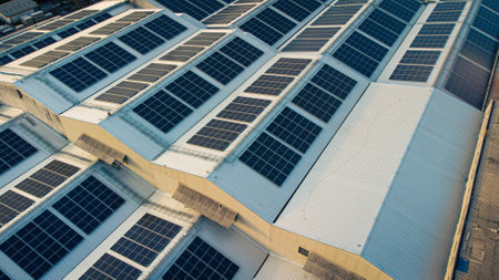 Solar cells on the solar farms of a large industrial factory. Solar farms are generating renewable energy for the industry. The goal is to reduce the cost of electricity.の写真素材