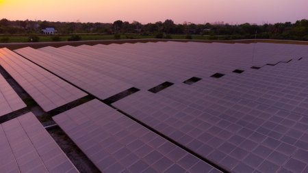 Solar Panels in the field at sunset, solar power plant.の写真素材