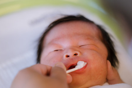 Baby boy was just born with Baby cloth wrapped around the whole body.の写真素材