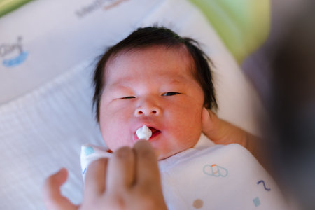 Baby boy was just born with Baby cloth wrapped around the whole body.