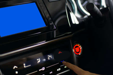 Touch air conditioning button inside a car