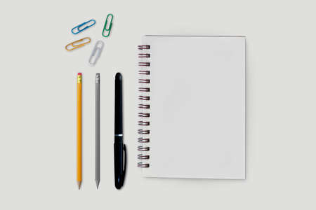 Flay lay, Top view notebook and pencil isolated on white backgroundの写真素材