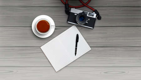 Top view blank notebook with film camera and white coffee cup on dark wood background - Flat lay minimalの写真素材