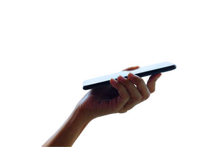 Hand holding mobile phone on isolated white backgroundの写真素材