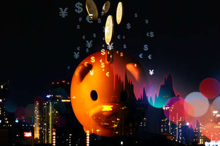 Save money in the economic downturn. Piggy bank The concept of lack of financial liquidity in an economic downturn - Money saving concept in time of pandemicの写真素材