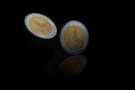 Coins baht with shadow isolated on dark background - Saving money concept
