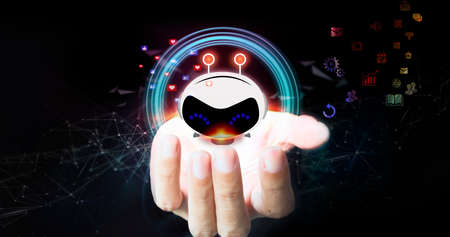 Hand holding with chatbot application access to information online network on dark background - AI innovation and technology conceptの写真素材