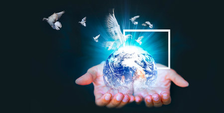 Conceptual image with Earth planet and flying birds on dark background. Think outside the box...