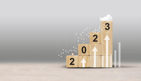 2023 Business up arrow development to success and growing growth concept. Businessman try to arrange...
