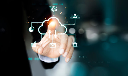 Businessman hand touching cloud computing icon on virtual screen with his fingerの写真素材