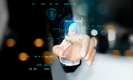 Businessman hand touch virtual security icon on virtual screen with bokeh backgroundの写真素材