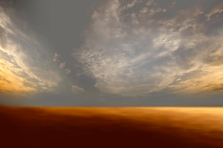 Sunset sky background with clouds and rays of light shining through.の写真素材