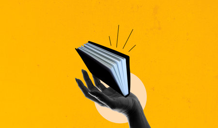 Hand holding open book over yellow background. Art collage digital pop modern art.の写真素材