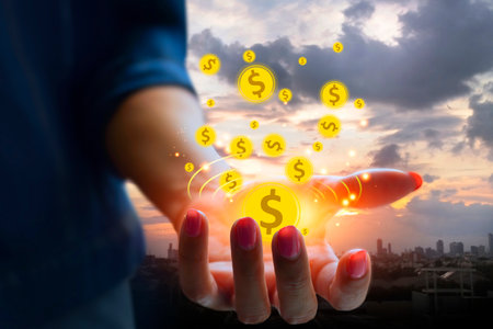 Double exposure of hand coins money on city background. Financial investment conceptの写真素材