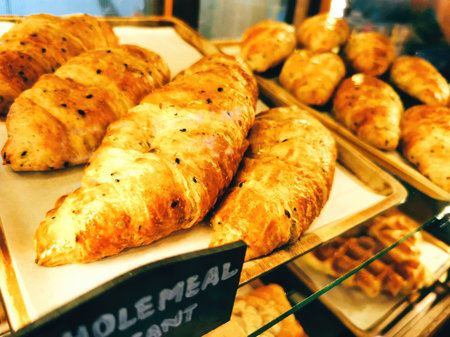 delicious croissants on the counter of a bakery shop.