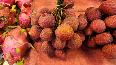 Fresh Lychee Fruit and Dragon Fruit at a Market