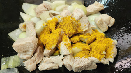 Pork and Onions with Curry Powder in a Wokの写真素材