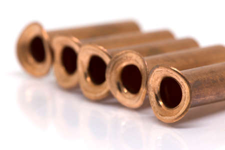 Copper connection pipe of Air-conditioner or Refrigerant system, bfore bazing or welding about Air-conditioner or Refrigerant system. Isolate photo on white background and selective focus.の写真素材