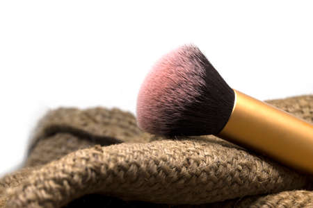 Old blush brush use with Blush On for make up, Selective focus and isolate on white background with text space.の写真素材