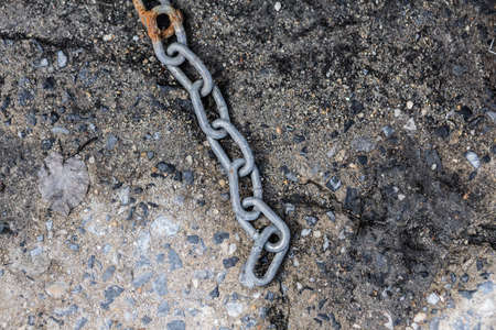 Old chain on concrete ground -Background