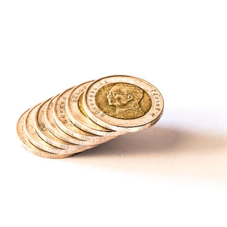 Thai baht, money, Thai coin.Money thai coins ( bath) staircase sorted on isolate. King of Thailand. The concept of financial planning, savings, Busines successful, Busines progress.の写真素材