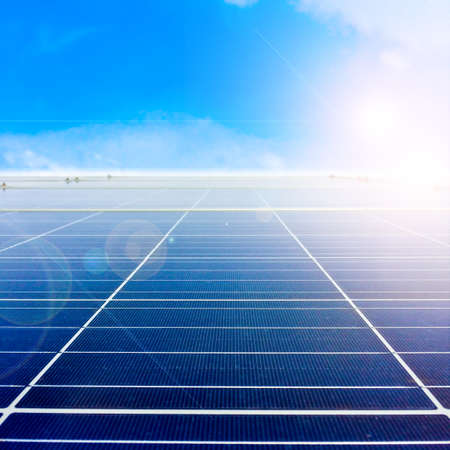 Soft focus of Solar panels or Solar cells on factory rooftop or terrace with sun light, Industry in...