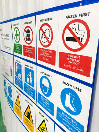 Warning Sign, No entrance, No Slipper, No Smoking, Safety first, Safety helmets, General danger. Include English language,Thai Language, Burmese Language, Lao language. white background. Construction area.の写真素材